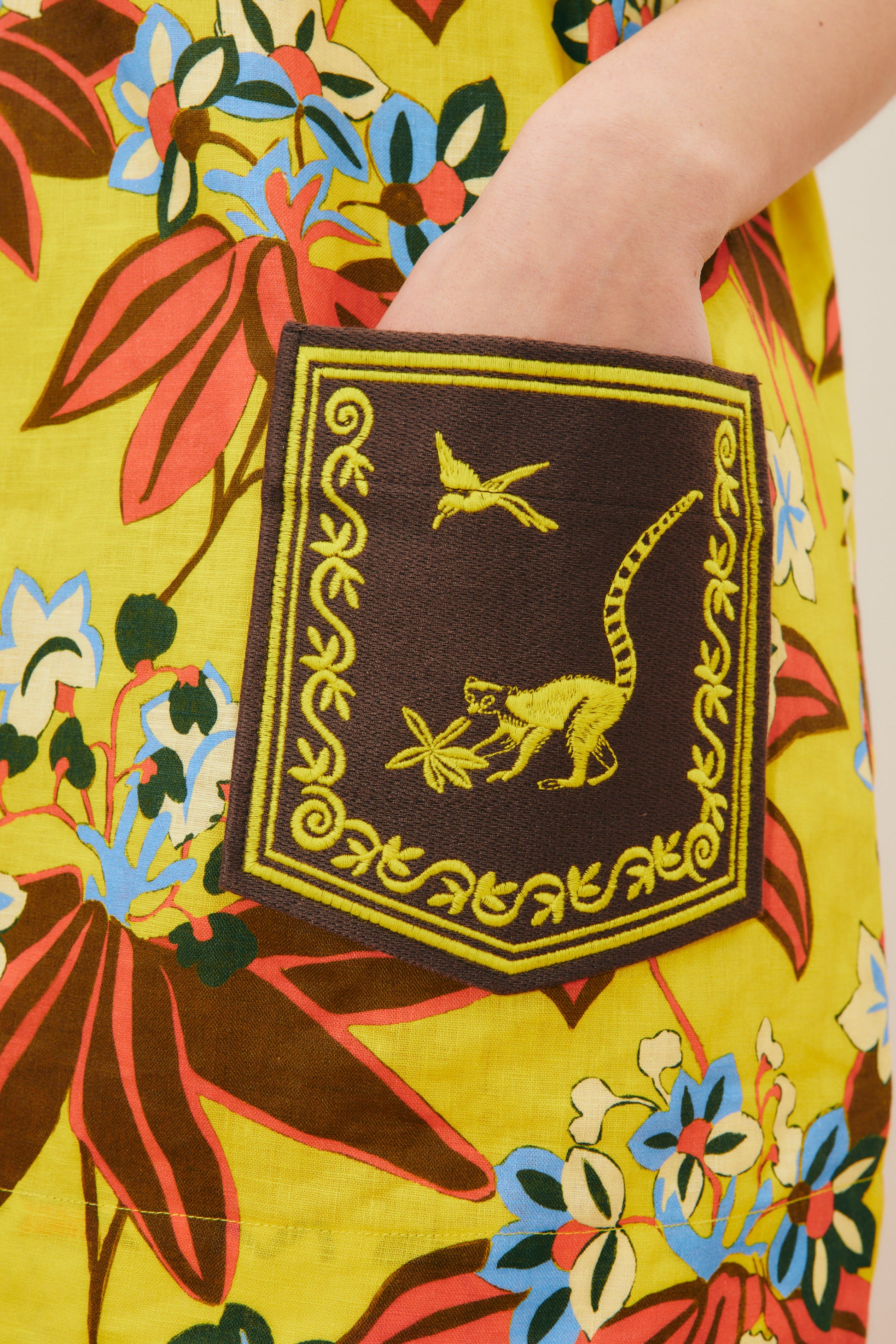 LEO EMBROIDERED MINI DRESS