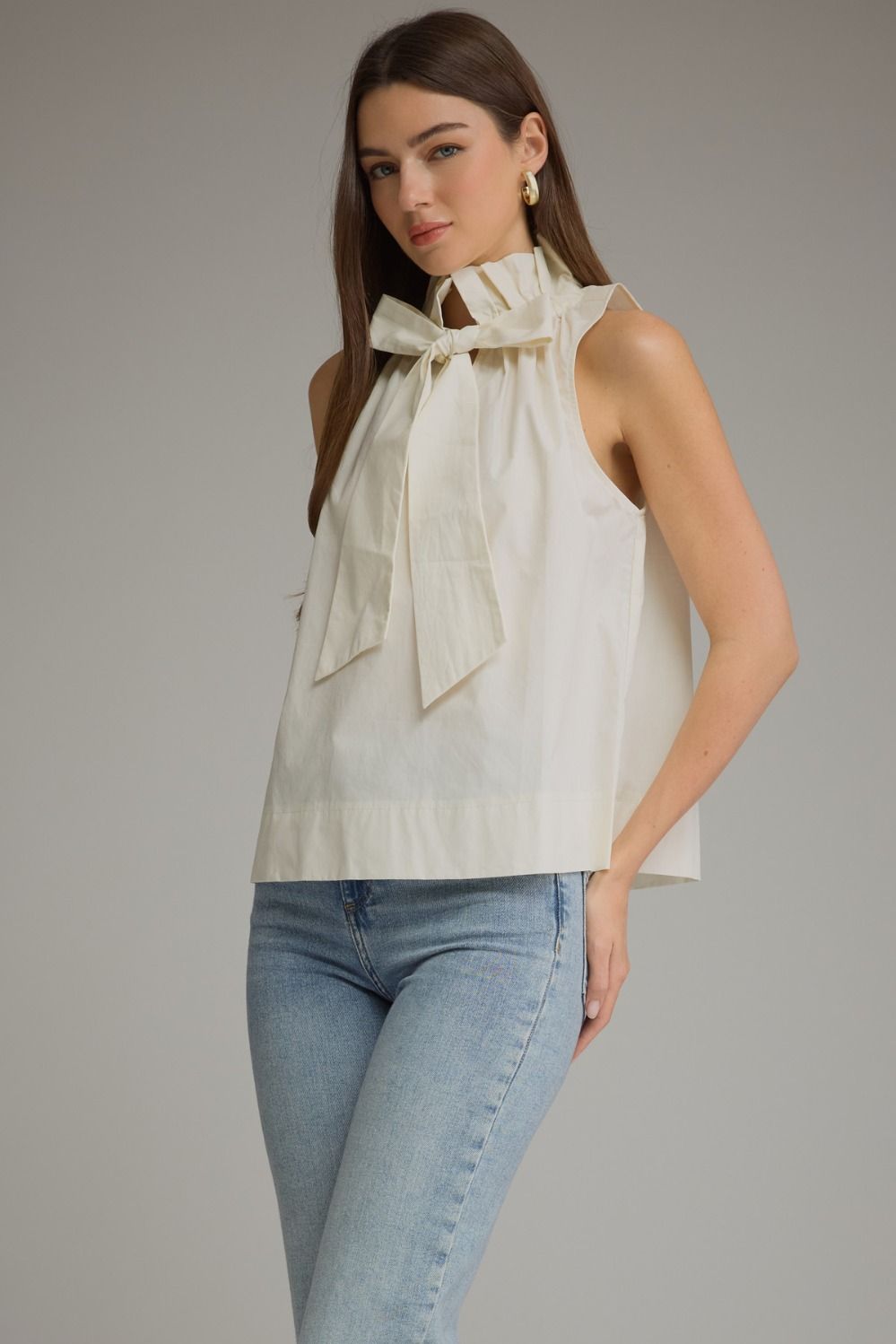 Ruffled High Neckline Sleeveless Top - Cream