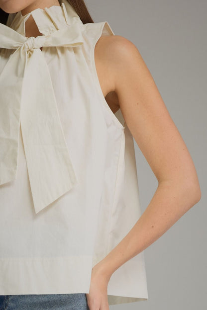 Ruffled High Neckline Sleeveless Top - Cream
